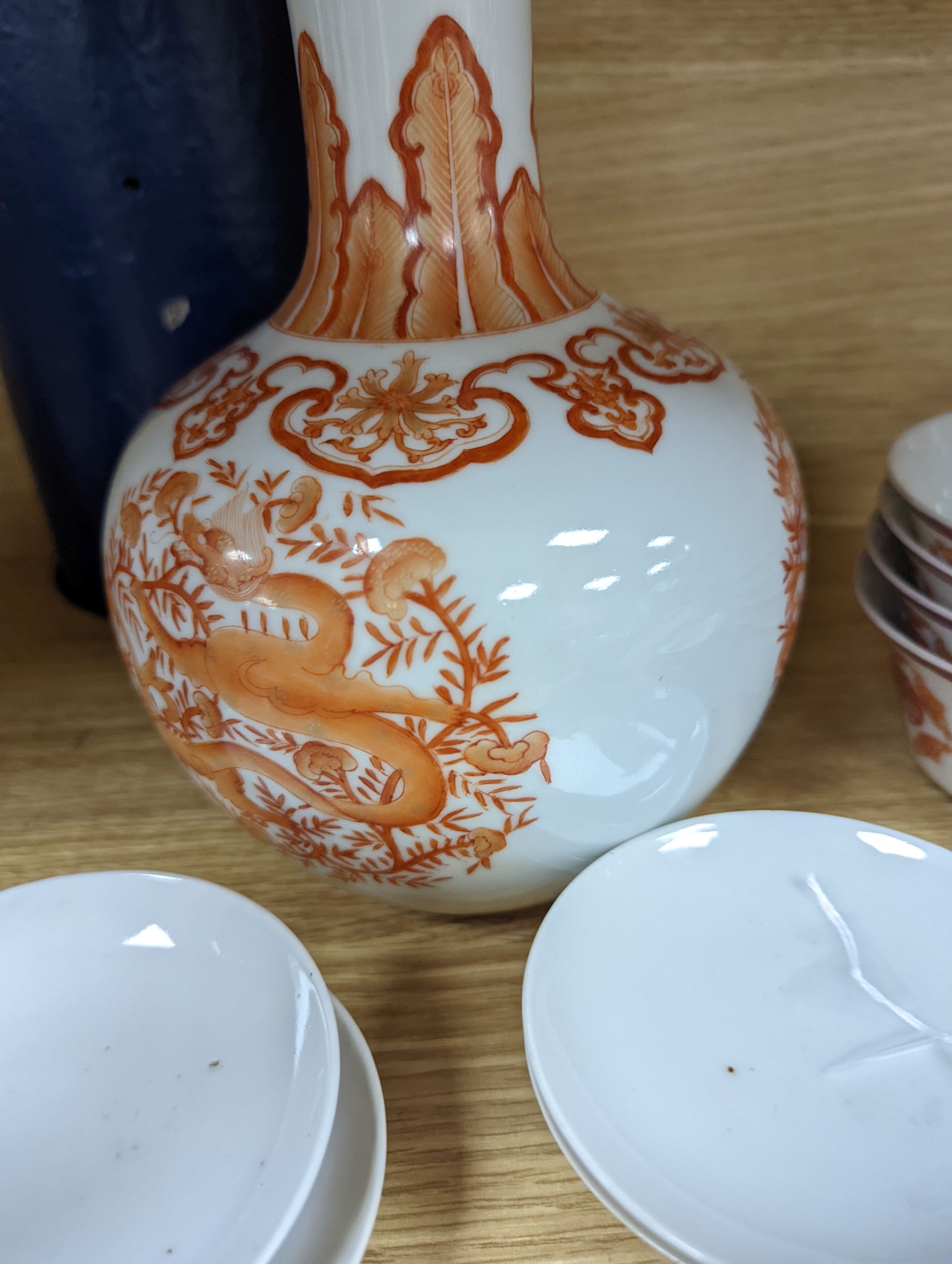 A set of five Chinese teabowls, covers and stands and a similar 'dragon' vase, 23cm